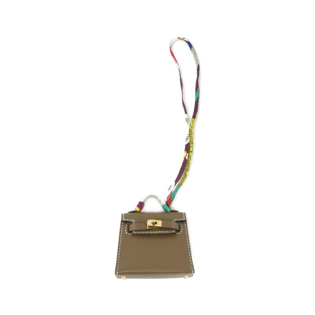 Hermes Kelly Twilly Mini Accessory Bag Charm: --- Catalog ---Category: SizeChain Length: 390.00mm / 15.35''Size (HxWxD): 55.00mm x 65.00mm x 20.00mm / 2.17'' x 2.56'' x 0.79''Category: DesignType: Handbag charmColor: Beige, Etoupe grayGender: Wom