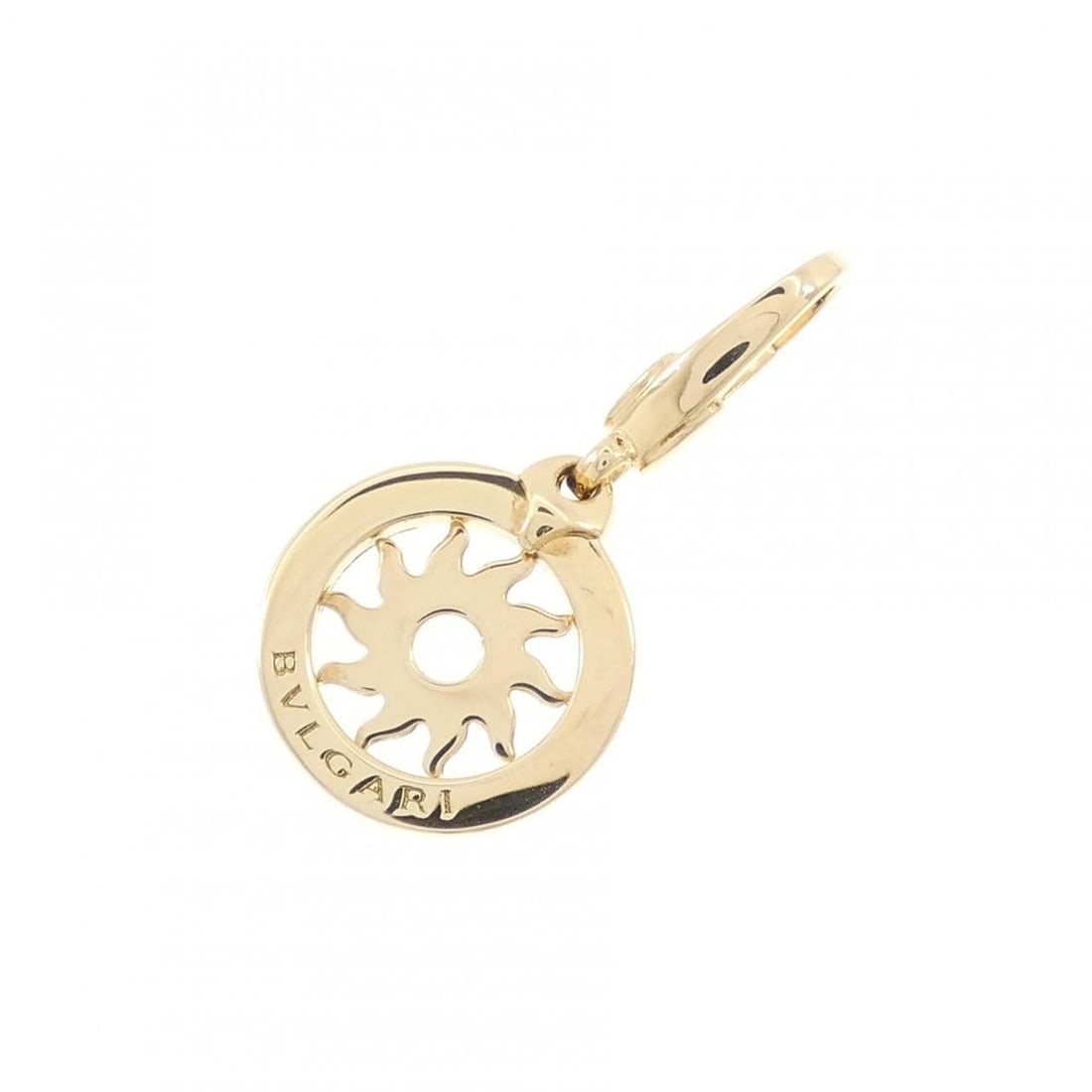 Bvlgari Tondo Sun Charm: --- Catalog ---Category: SizeSize (HxWxD): 29.00mm x 14.50mm / 1.14'' x 0.57''Category: DesignType: Necklace charmGender: WomenMaterial: Yellow gold (18K)Category: GeneralBrand: Bvlgari--- Item List -
