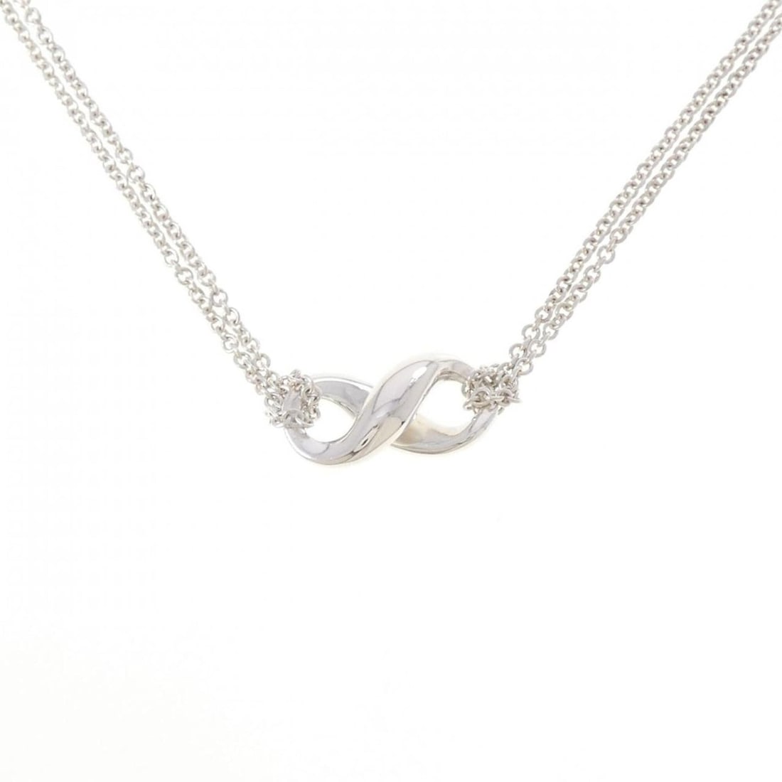 Tiffany & Co. Figure Eight Necklace: --- Catalog ---Category: SizePendant Size: 9.5mm / 0.37''Neck Circumference: 41 cm / 16.14''Category: DesignGender: WomenMaterial: Silver 925Necklace Type: NecklaceCategory: GeneralBrand: Tiffany---