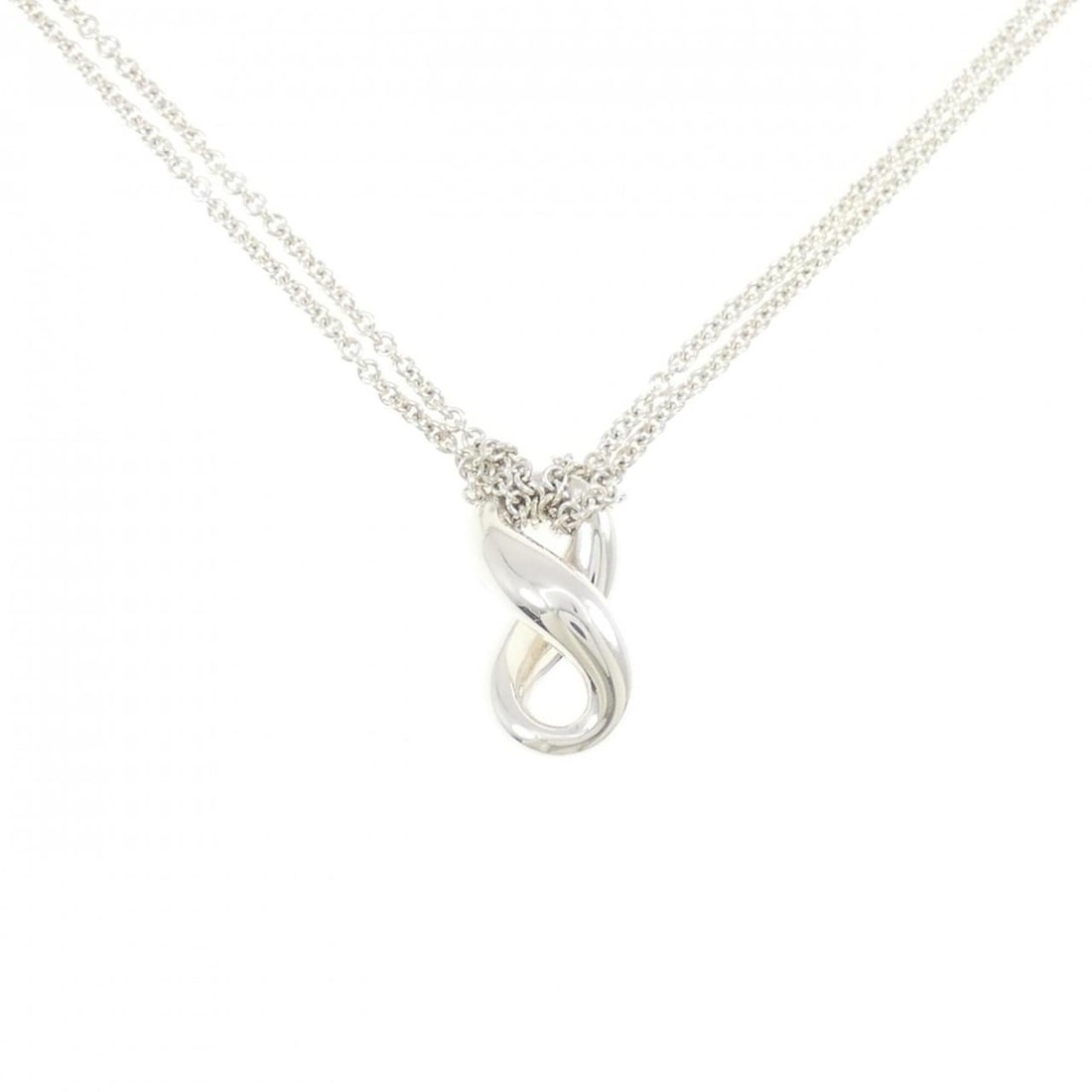 Tiffany & Co. Figure Eight Necklace: --- Catalog ---Category: SizePendant Size: 18.4mm x 9.2mm / 0.72'' x 0.36''Neck Circumference: 40 cm / 15.74''Category: DesignGender: WomenMaterial: Silver 925Pendant Type: PendantNecklace Type: