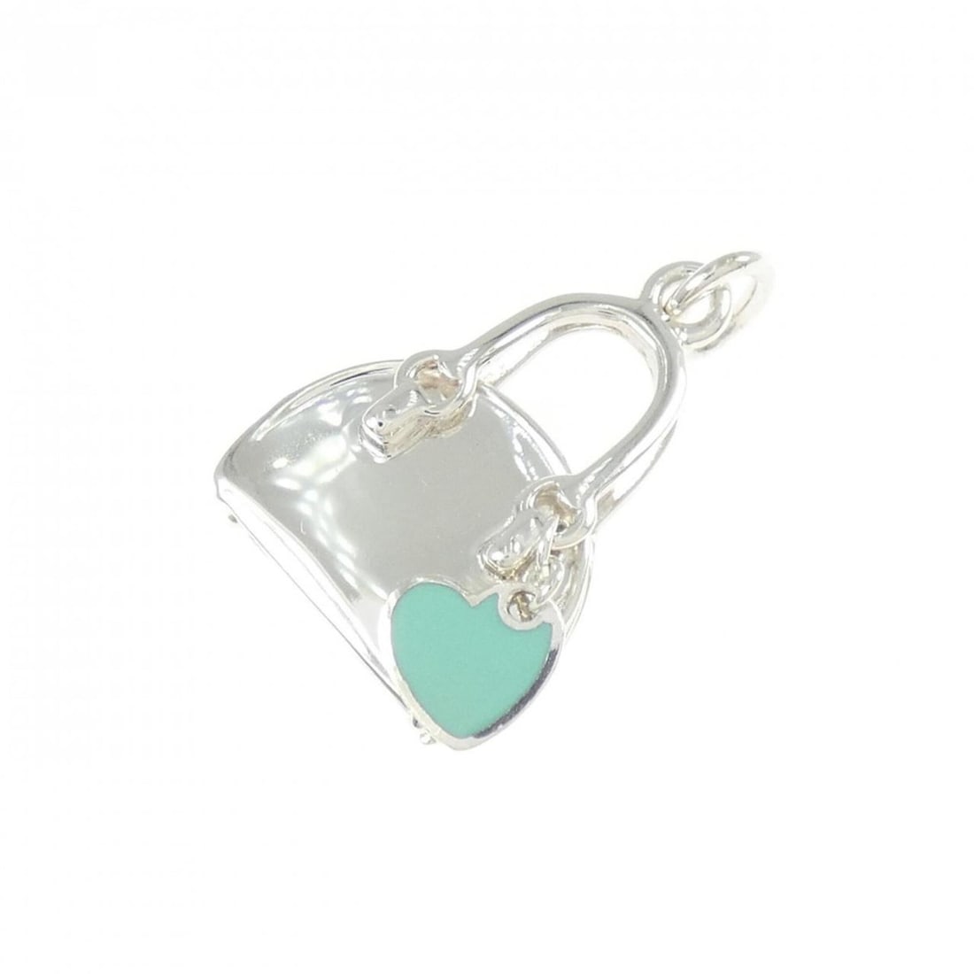 Tiffany handbag pendant: --- Catalog ---Category: SizePendant Size: 25.5mm x 14.4mm / 1'' x 0.56''Category: DesignGender: WomenMaterial: Silver 925Necklace Type: PendantCategory: GeneralBrand: Tiffany--- Item List