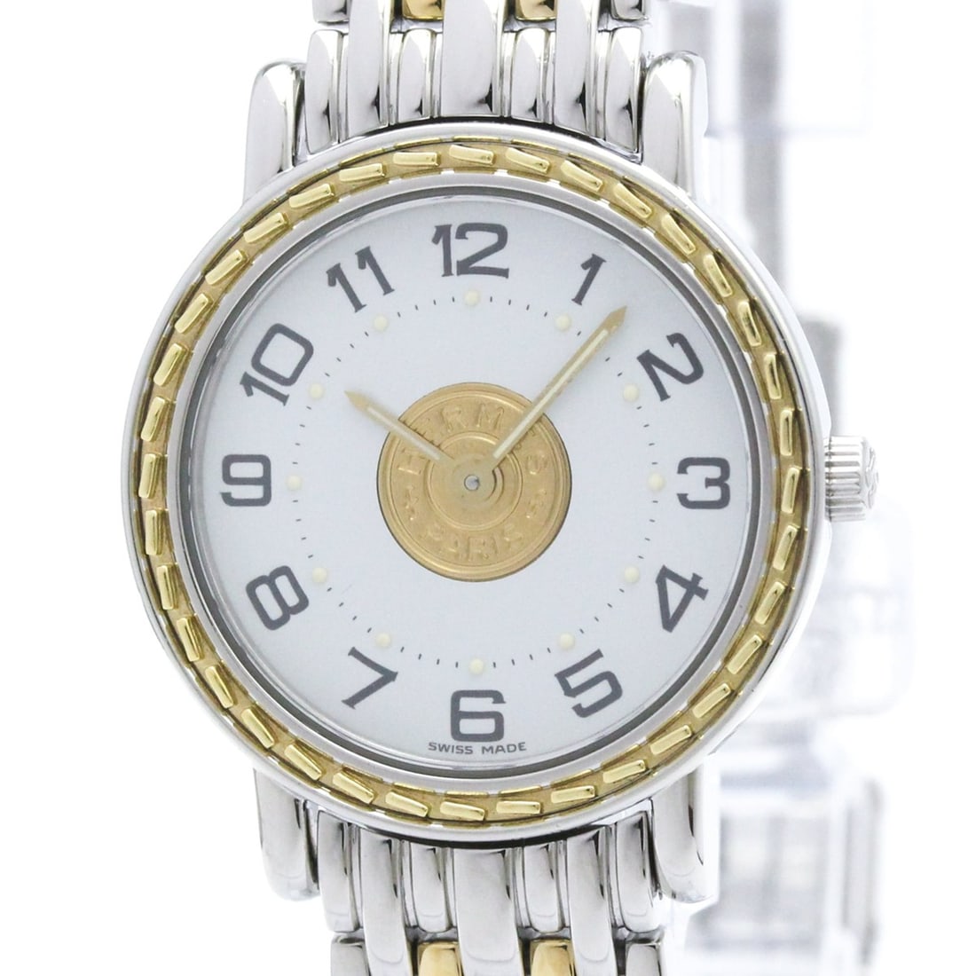 HERMES Sellier Gold Plated Steel Quartz Ladies Watch SE4.220 Polished: --- Catalog ---Category: SizeCase Diameter: 24mm / 0.94''Category: DesignType: WristwatchStyle: Dress/FormalGender: WomenColor (Dial): WhiteMaterial (Band): Gold plated, Stainless steelMaterial (Case)