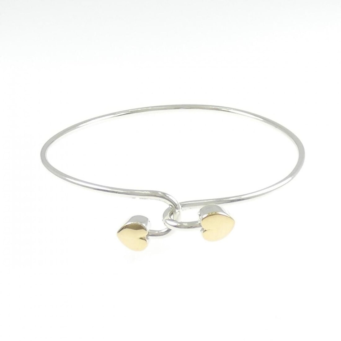Tiffany & Co. 925 750YG Bangle: --- Catalog ---Category: SizeLength: 17cm / 6.69''Category: DesignType: BangleGender: WomenMaterial: Silver 925, Yellow gold (18K)Category: GeneralBrand: Tiffany--- Item List ---Section: ConditionRank