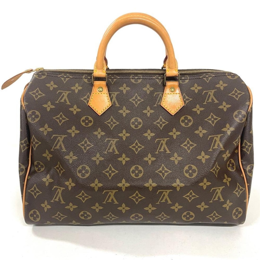 Louis Vuitton Speedy 35 Handbag, Monogram Canvas, M41107, Brown, Gold Hardware: --- Catalog ---Category: SizeSize (HxWxD): 23cm x 35cm x 18cm / 9.05'' x 13.77'' x 7.08''Handle Length: 25cm / 9.84''Category: DesignType: HandbagColor: Brown, MonogramGender: WomenClosure: ZipperMate