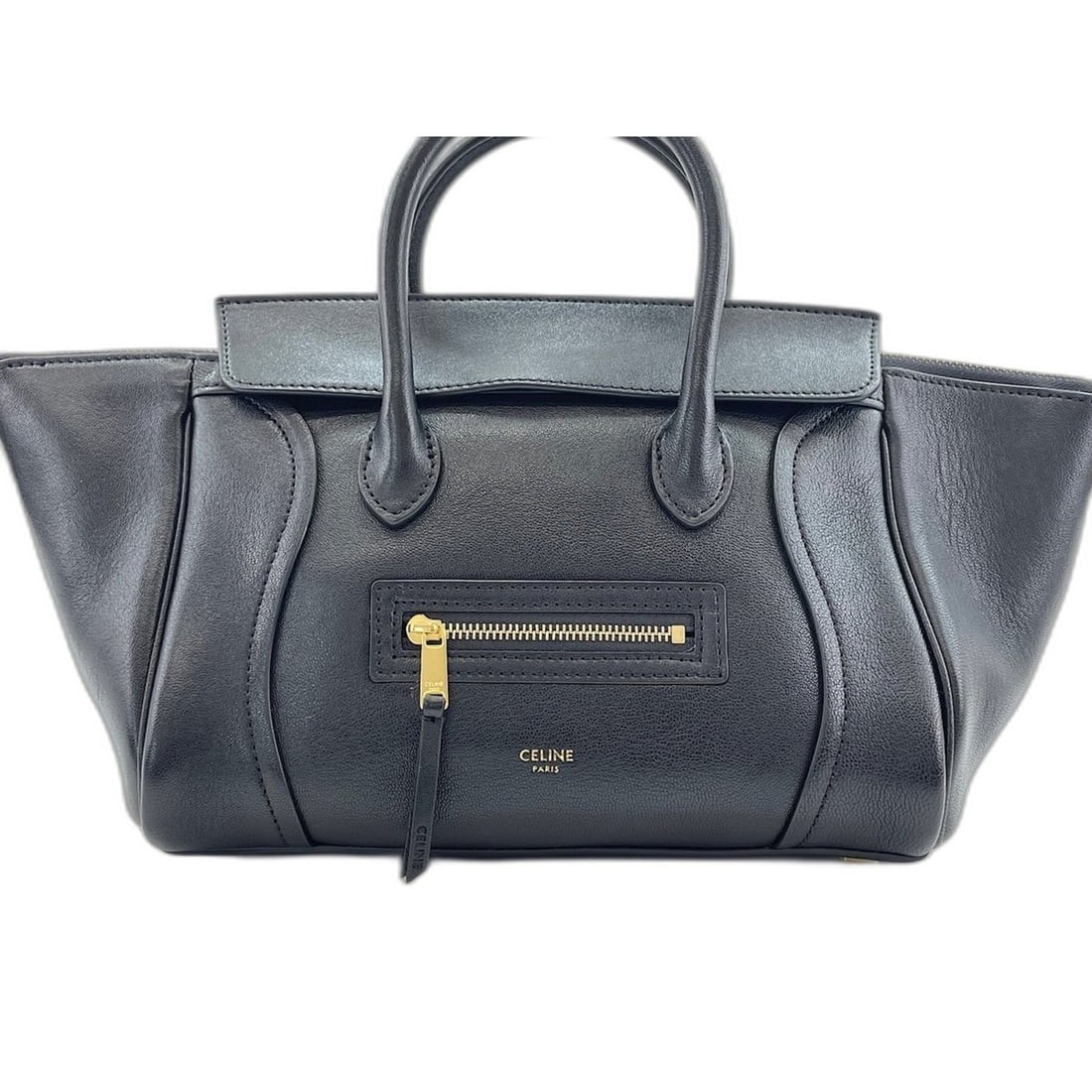 Celine Little Luggage Handbag, Leather, Black: --- Catalog ---Category: SizeSize (HxWxD): 18cm x 36cm x 8cm / 7.08'' x 14.17'' x 3.14''Category: DesignType: HandbagColor: BlackGender: WomenMaterial: Leather Category: GeneralBrand: Celine--- Item L