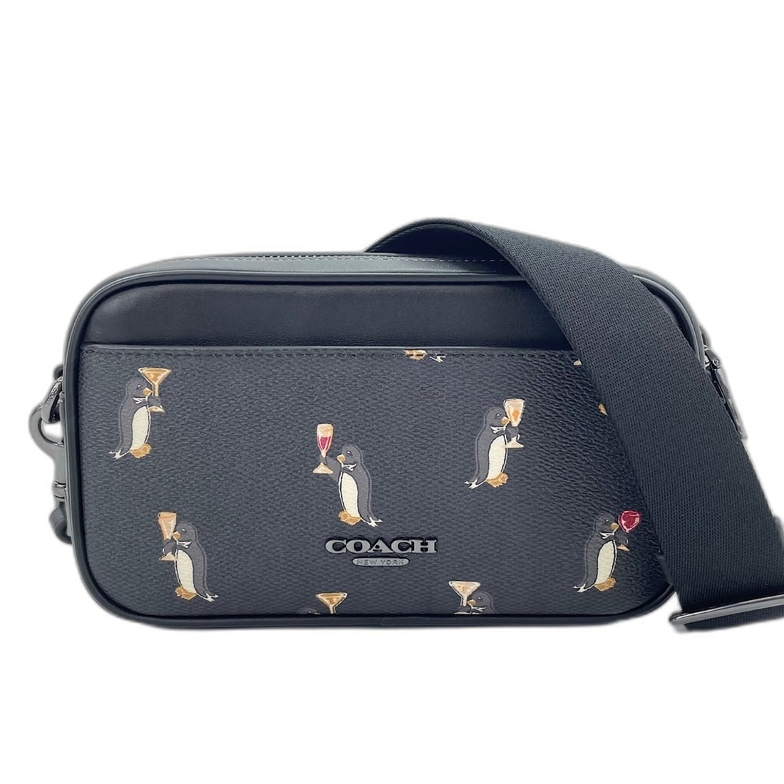Coach Jayden Crossbody Penguin Print 2-Way Shoulder Bag, Leather, Black: --- Catalog ---Category: SizeSize (HxWxD): 11cm x 20cm x 5cm / 4.33'' x 7.87'' x 1.96''Category: DesignType: Shoulder bagColor: Black, WhiteGender: WomenMaterial: Leather Category: GeneralBrand: Coach