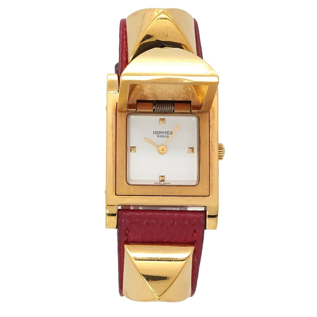 Hermes Medor Women's Watch, Pyramid Design, Gold Studs, White and Red Leather Strap, Quartz: --- Catalog ---Category: SizeWrist Size: 13.5cm - 16cm / 5.31'' - 6.29''Case Diameter: 23mm / 0.91''Category: DesignType: WristwatchGender: WomenColor (Dial): WhiteMaterial (Band): Gold plated, Leathe