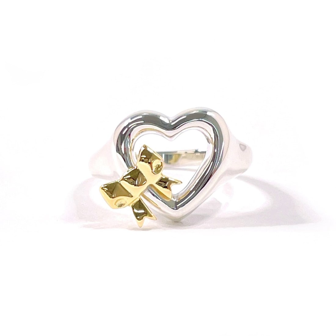 TIFFANY&Co. Tiffany Heart Ribbon Ring, Sterling Silver 925/18K Yellow Gold, Size 9.5, Silver,: --- Catalog ---Category: SizeJP Size: 9.5US Size: 5Category: DesignType: Band ringColor: Gold, SilverGender: WomenMaterial: Silver 925, Yellow gold (18K)Category: GeneralBrand: Tiffany--- Item List
