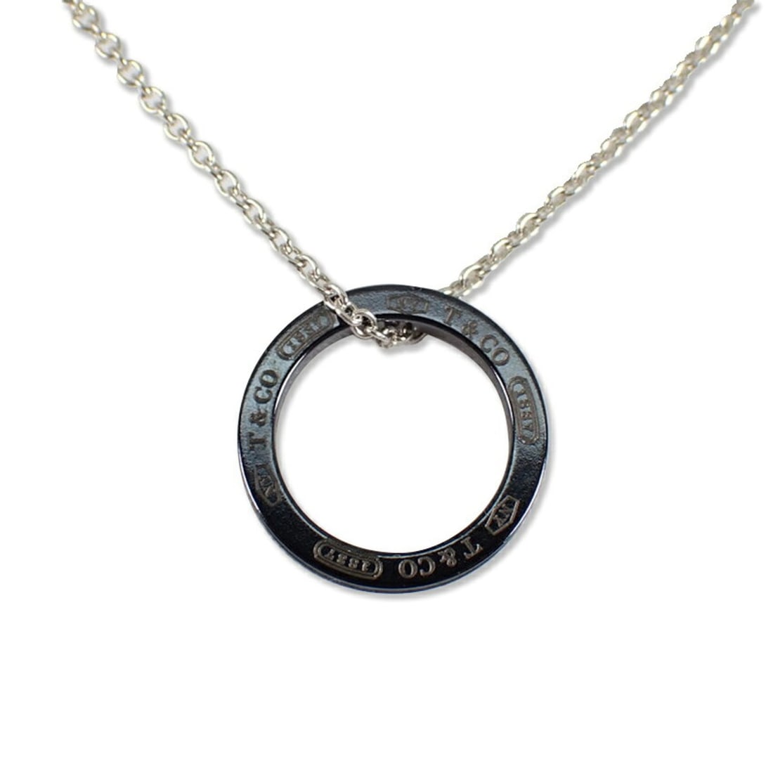TIFFANY & Co. Titanium 925 1837 Circle Necklace: --- Catalog ---Category: SizePendant Size: 17.8mm / 0.7''Neck Circumference: 41 cm / 16.14''Category: DesignGender: WomenMaterial: Sterling silver 925, TitaniumNecklace Type: NecklaceCategory: General