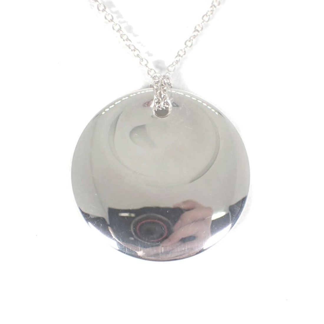 TIFFANY & Co. 925 Round Pendant Necklace: --- Catalog ---Category: SizePendant Size: 23.3mm / 0.91''Neck Circumference: 38 cm / 14.96''Category: DesignGender: WomenMaterial: Sterling silver 925Necklace Type: NecklaceCategory: GeneralBrand: Ti