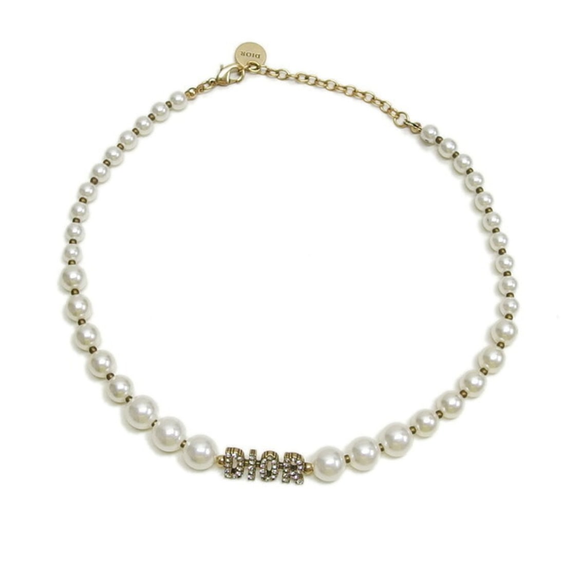 Christian Dior faux pearl necklace with rhinestones: --- Catalog ---Category: SizePendant Size: 10mm x 27mm / 0.39'' x 1.06''Stone Diameter: 10.00mm / 0.39''Neck Circumference: 34.5 cm - 49.5 cm / 13.58'' - 19.48''Category: DesignColor: WhiteStone: Rhin