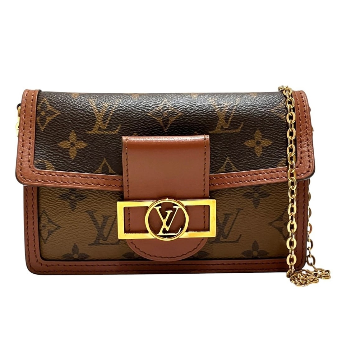 Louis Vuitton Portefeuille Dauphine Shoulder Bag, Monogram Reverse Canvas and Leather: --- Catalog ---Category: SizeSize (HxWxD): 13cm x 18.5cm x 5cm / 5.11'' x 7.28'' x 1.96''Strap Length: 115cm / 45.27''Category: DesignType: Shoulder bagColor: Brown, Galle, Monogram ReverseClosure: Ma