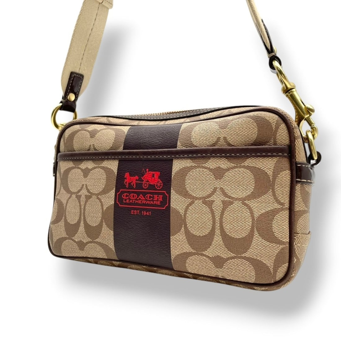 Coach Heritage Stripe Flight Bag Signature Mini Shoulder Pouch Leather Beige Light Brown Dark Gold: --- Catalog ---Category: SizeSize (HxWxD): 13cm x 24cm x 6cm / 5.11'' x 9.44'' x 2.36''Category: DesignType: Shoulder bagColor: Beige, Light brownGender: WomenMaterial: PVC , Leather Category: General