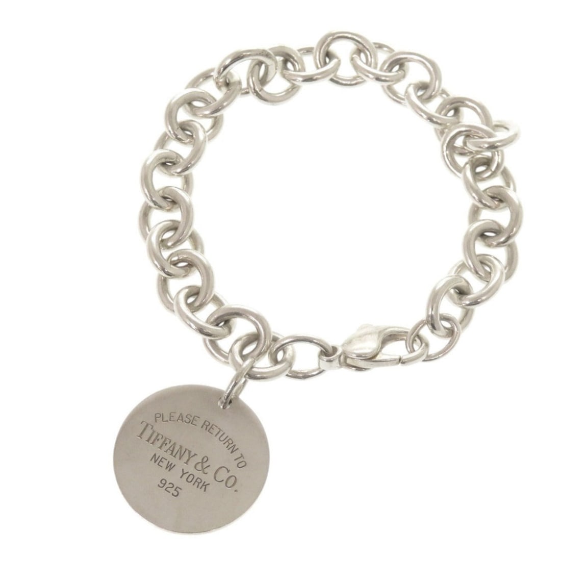 Tiffany & Co. Return to Round Tag Sterling Silver 925 Bracelet (Silver 1030): --- Catalog ---Category: SizeLength: 19cm / 7.48''Category: DesignType: Charm braceletColor: SilverGender: WomenMaterial: Silver 925Category: GeneralBrand: Tiffany--- Item List ---Section: ConditionRa