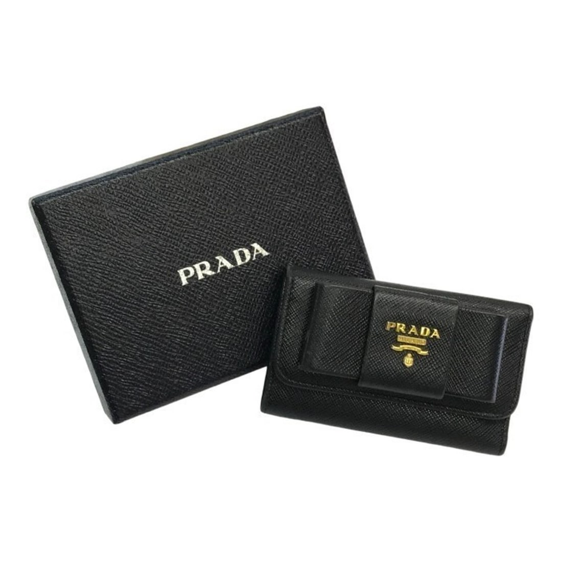 PRADA Prada 6-Key Case for Women, Saffiano Leather, Black: --- Catalog ---Category: DesignType: KeycaseColor: BlackGender: WomenMaterial: Leather Category: GeneralLine: SaffianoBrand: PradaCountry of Origin: ItalyCategory: Physical PropertiesSize (HxWxD): 6.5