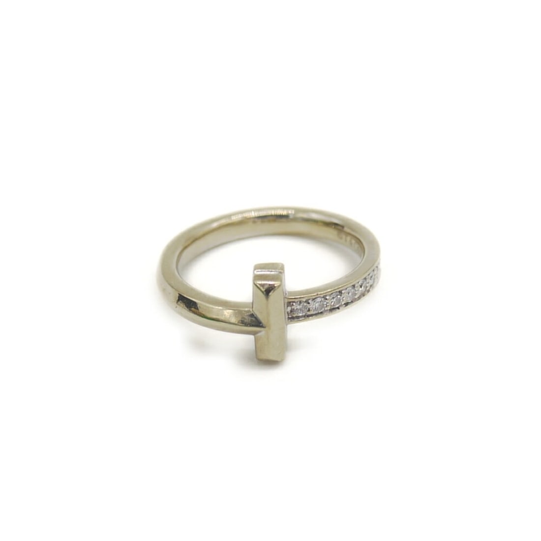 TIFFANY & Co. Tiffany T One Narrow Ring Diamond 18K White Gold Size 7: --- Catalog ---Category: SizeJP Size: 7US Size: 4Category: DesignType: Band ringColor: SilverStone: DiamondGender: WomenMaterial: White gold (18K)Category: GeneralBrand: Tiffany--- Item List ---Sectio