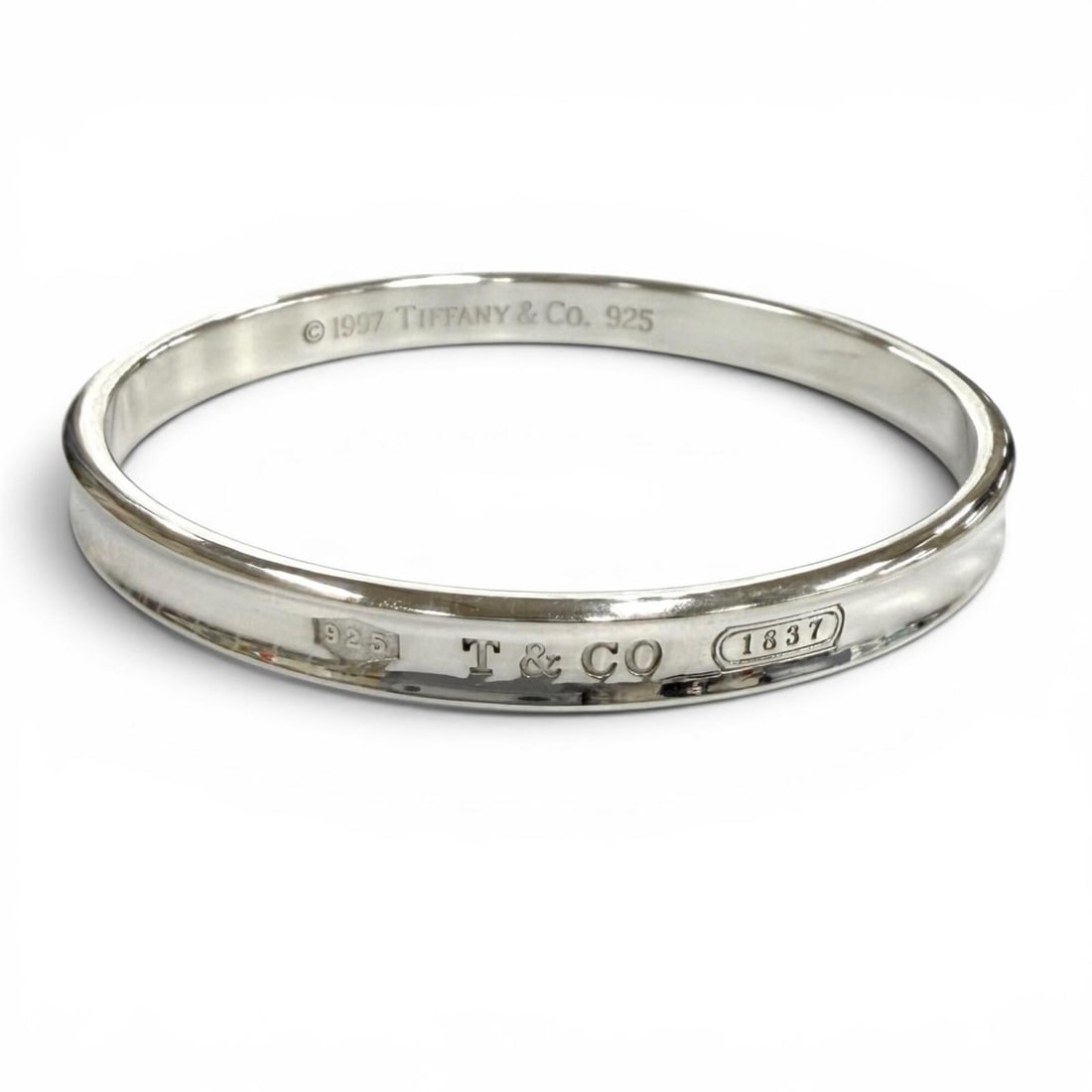 TIFFANY&Co. Tiffany 1837 Narrow Bangle 925 Bracelet Accessory Silver Weight 33g Women's: --- Catalog ---Category: SizeLength: 18.5cm / 7.28''Category: DesignType: BangleColor: SilverGender: WomenMaterial: Silver 925Category: GeneralBrand: Tiffany--- Item List ---Section: ConditionRanking: