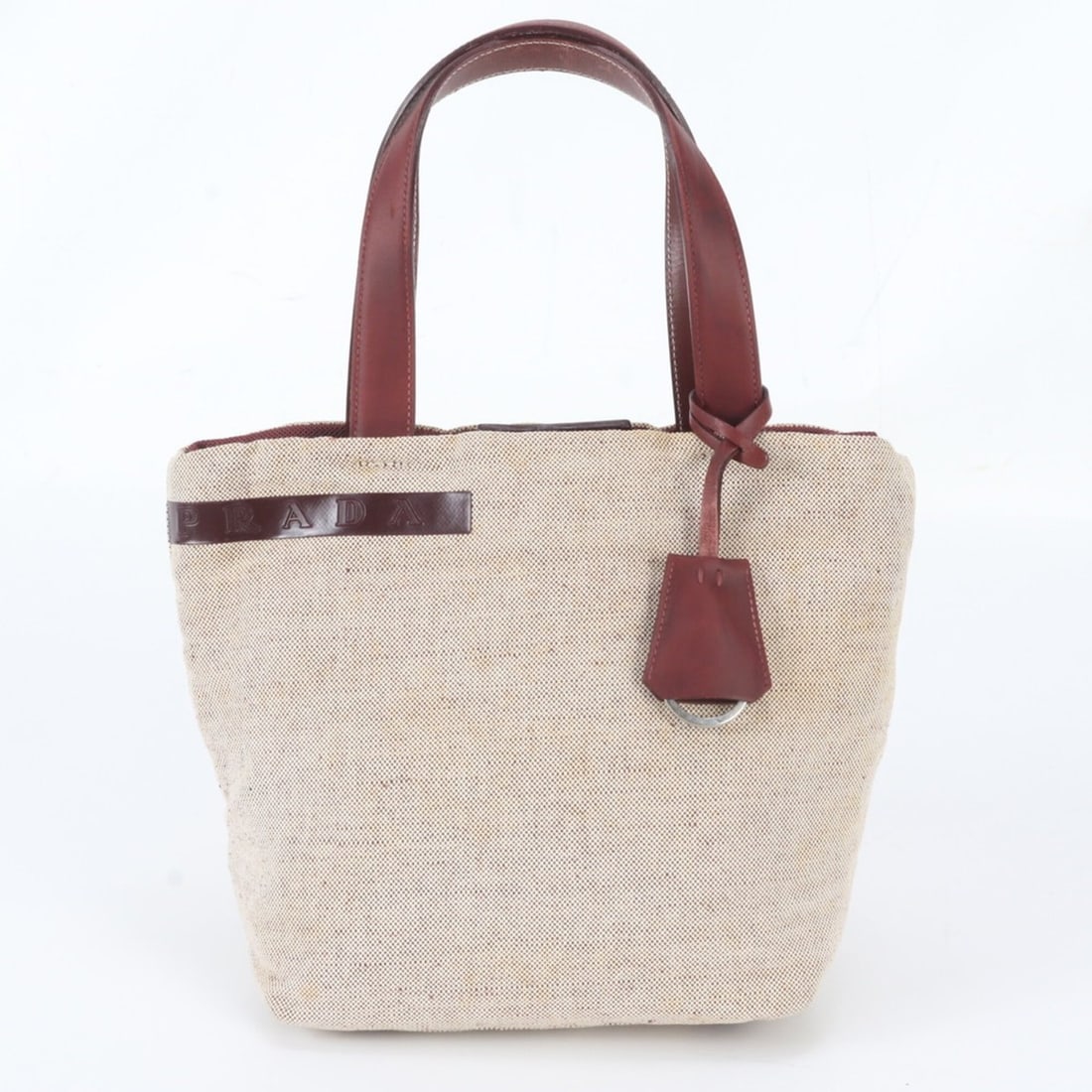 Prada Leather Canvas Tote Bag, Handbag, Shoulder Brand Name, Women's: --- Catalog ---Category: SizeSize (HxWxD): 23cm x 20cm x 10cm / 9.05'' x 7.87'' x 3.93''Category: DesignType: Handbag, Shoulder bag, Tote bagColor: Beige, Red color, WineGender: WomenMaterial: Leather