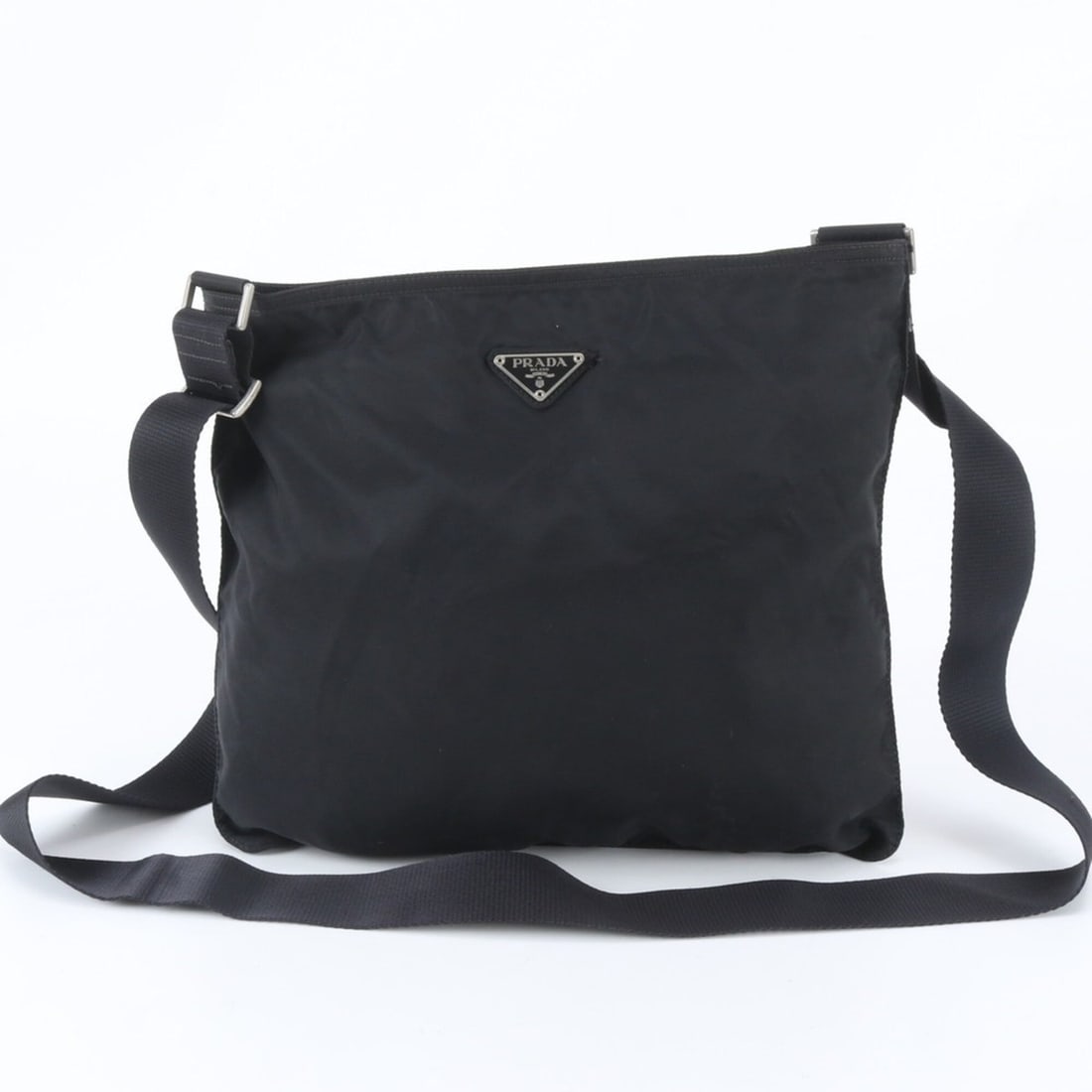 Prada Tessuto Nylon Triangle Logo Leather Shoulder Bag Messenger Black Men's: --- Catalog ---Category: SizeSize (HxWxD): 30cm x 33cm x 3cm / 11.81'' x 12.99'' x 1.18''Category: DesignType: Messenger bag, Shoulder bagColor: BlackGender: MenMaterial: Nylon , Leather Category: Gen