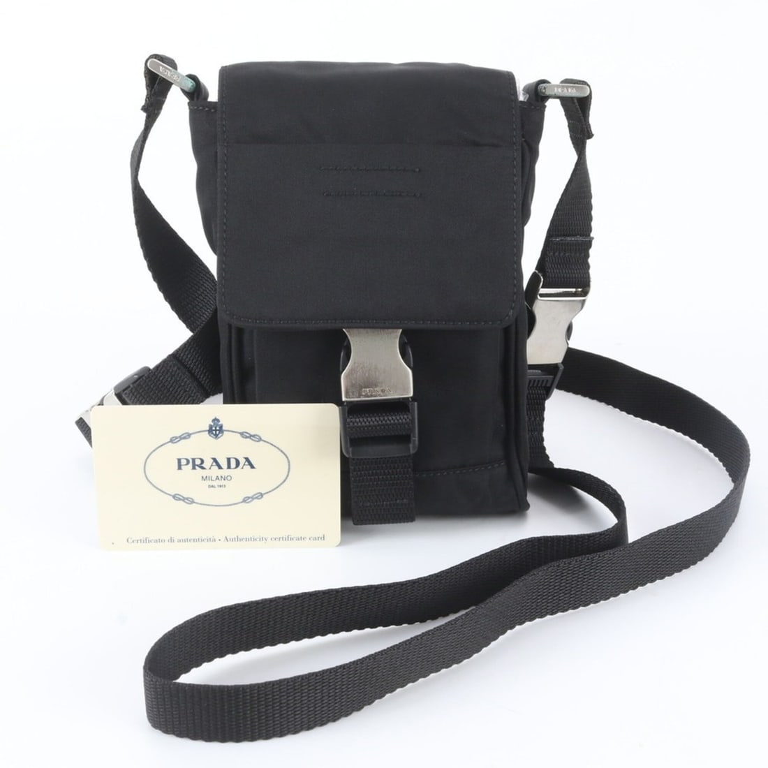 Prada Tessuto Nylon MV583 Shoulder Bag Messenger Bag, Black, with Guarantee Card, for Men: --- Catalog ---Category: SizeSize (HxWxD): 17cm x 11cm x 4cm / 6.69'' x 4.33'' x 1.57''Category: DesignType: Messenger bag, Shoulder bagColor: BlackGender: MenCategory: GeneralBrand: PradaCountry of O
