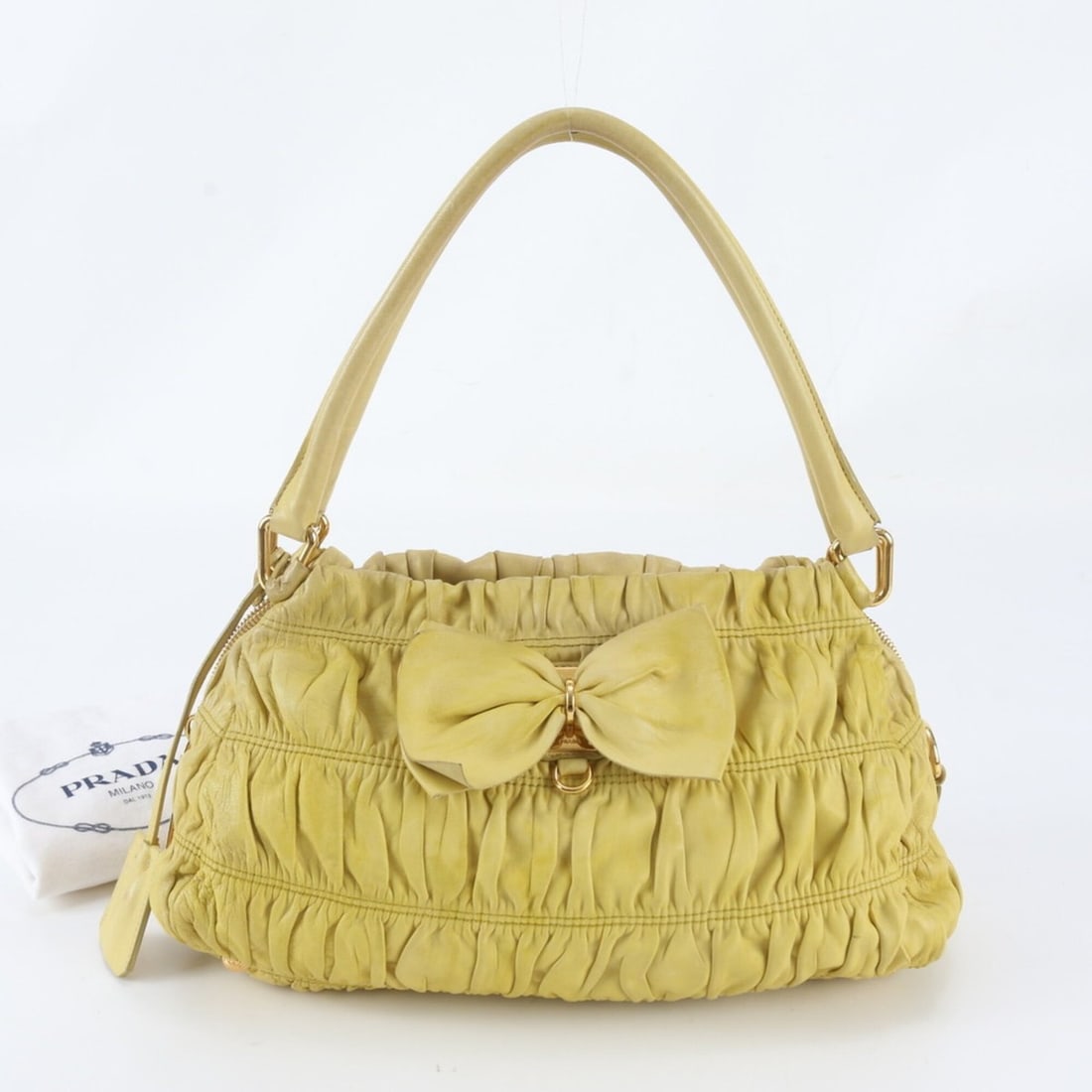 Prada Tessuto Nylon Gathered Ribbon Leather Tote Bag Handbag Shoulder for Women: --- Catalog ---Category: SizeSize (HxWxD): 18cm x 31cm x 12cm / 7.08'' x 12.2'' x 4.72''Category: DesignType: Handbag, Shoulder bag, Tote bagColor: YellowGender: WomenMaterial: Leather Category: Gener