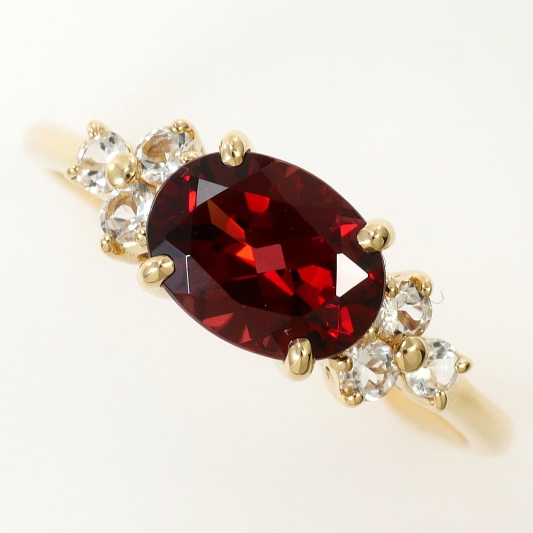 K10 10K YG Yellow Gold Ring, 1 Garnet and White Topaz, Total Weight 1.6g, Jewelry: --- Catalog ---Category: SizeWidth: 6mm / 0.24''Weight: 1.6g / 0.05oz.JP Size: 13US Size: 6.5Category: DesignType: Band ringColor: Yellow goldMetal: GoldStone: Garnet, TopazGender: WomenMaterial: Yell
