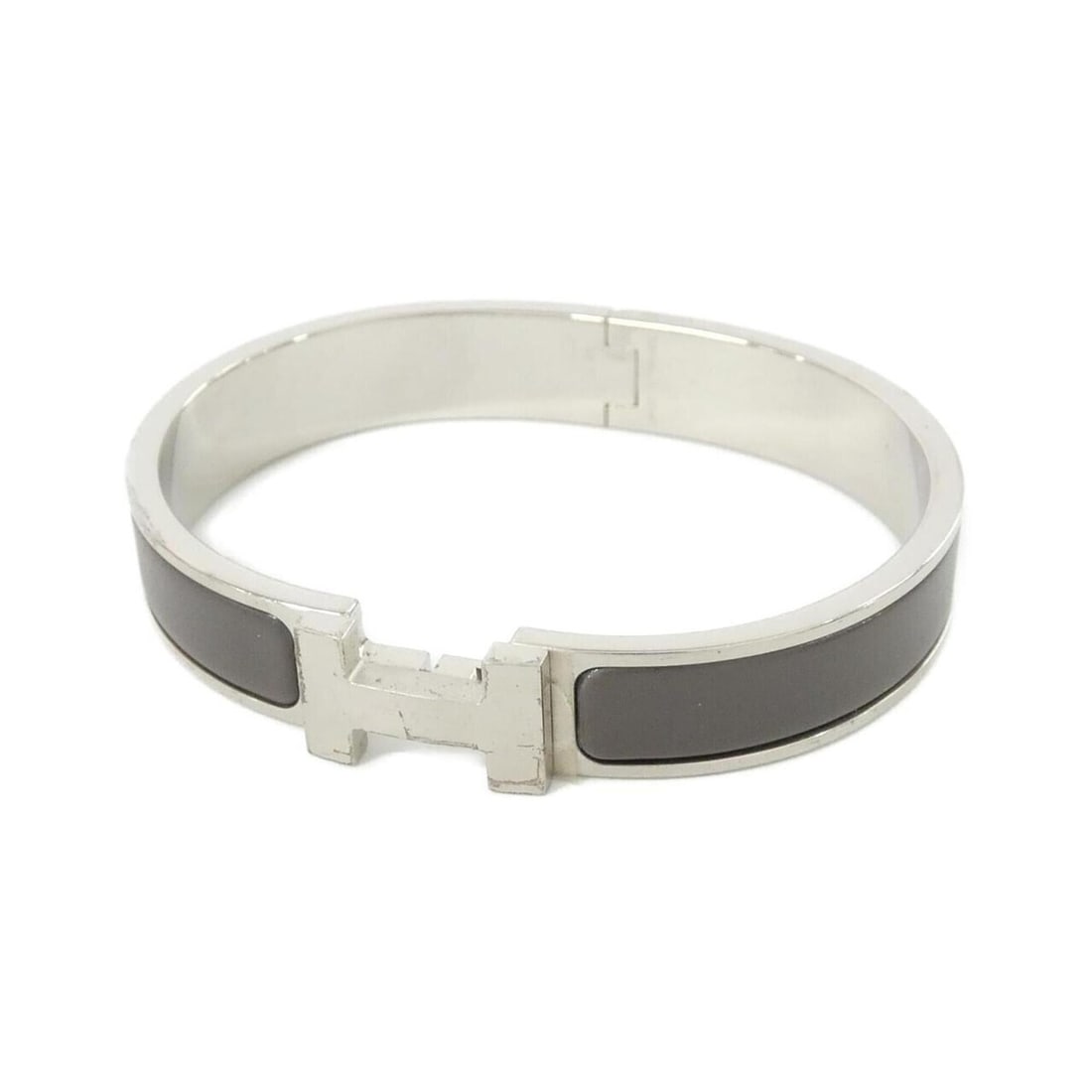 Hermes Click H 703203FB Bracelet: --- Catalog ---Category: SizeWidth: 1.2cm / 0.47''Length: 18.5cm / 7.28''Category: DesignType: Charm braceletColor: GrayGender: WomenCategory: GeneralMPN: 703203FBBrand: Hermes--- Item List ---Section
