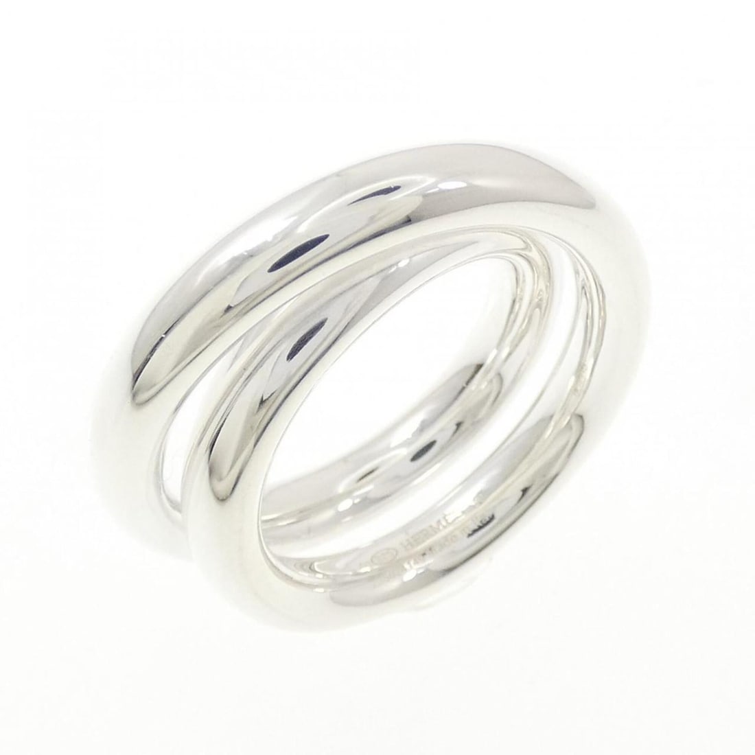 Hermes Vertige Ring: --- Catalog ---Category: SizeUS Size: 8Brand Size: 56Category: DesignType: Band ringGender: WomenMaterial: Silver 925Category: GeneralMPN: H104261BBrand: Hermes--- Item List ---Section: