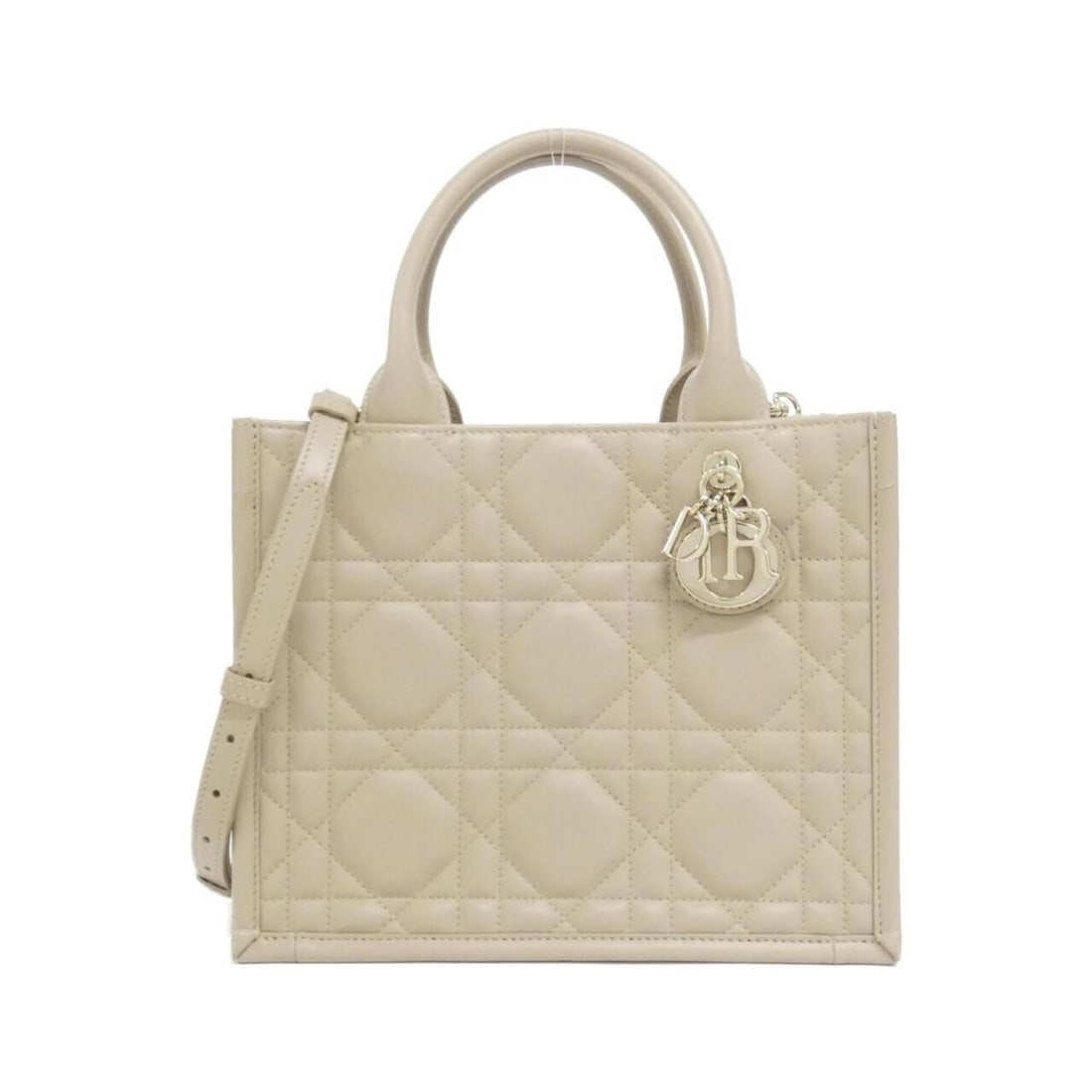 Christian Dior Book Tote Small M1325OWHP Handbag: --- Catalog ---Category: SizeSize (HxWxD): 22cm x 227cm x 15cm / 8.66'' x 89.37'' x 5.9''Category: DesignType: HandbagColor: BeigeGender: Women,MenMaterial: Leather Leather/Fur Type: