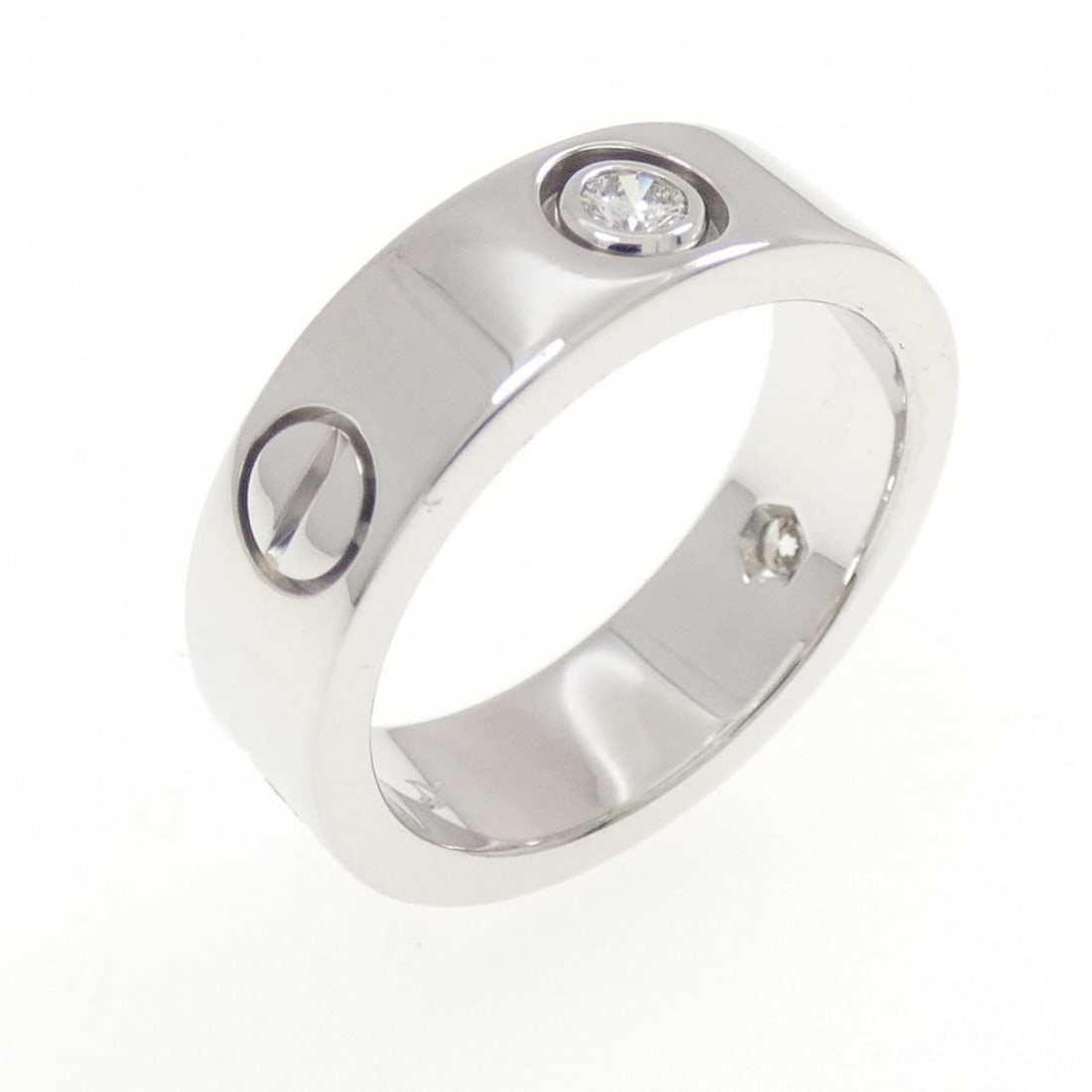 Cartier Love Half-Diamond Ring: --- Catalog ---Category: SizeWidth: 5.5mm / 0.22''Weight: 8.2g / 0.28oz.JP Size: 10US Size: 5.5Category: DesignType: Band ringStone: DiamondGender: WomenMaterial: White gold (18K)Category: