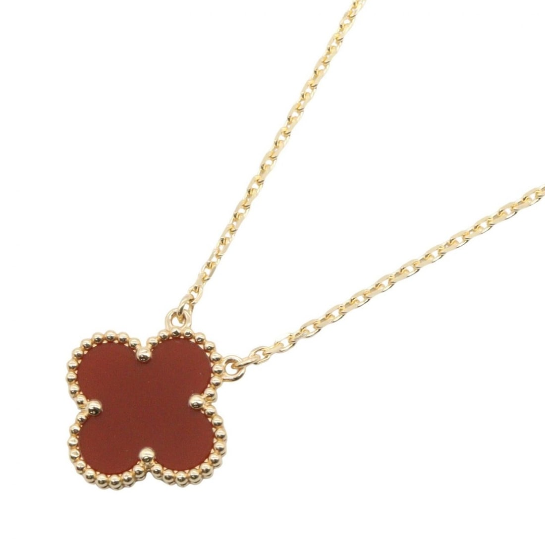 Van Cleef & Arpels Vintage Alhambra Carnelian Necklace, 18K (Yellow Gold), Carnelian, Women's,: --- Catalog ---Category: SizePendant Size: 15mm x 15mm / 0.59'' x 0.59''Neck Circumference: 37 cm - 41.5 cm / 14.56'' - 16.33''Category: DesignColor: Gold, Red colorGender: WomenMaterial: Yellow gold