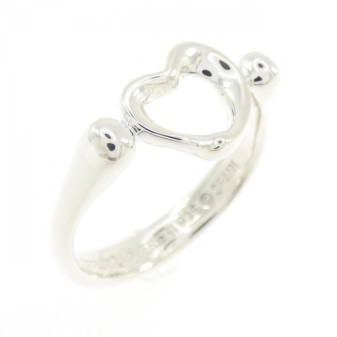 Tiffany Open Heart Ring: --- Catalog ---Category: SizeJP Size: 10US Size: 5.5Category: DesignType: Band ringGender: WomenMaterial: Silver 925Category: GeneralBrand: Tiffany--- Item List ---Section: ConditionRanking: Rank SA