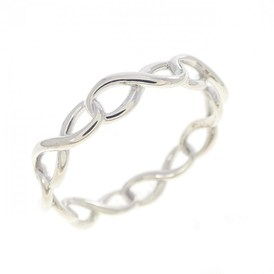 Tiffany Infinity Ring: --- Catalog ---Category: SizeJP Size: 12US Size: 6.5Category: DesignType: Band ringGender: WomenMaterial: Silver 925Category: GeneralBrand: Tiffany--- Item List ---Section: ConditionRanking: Rank SA