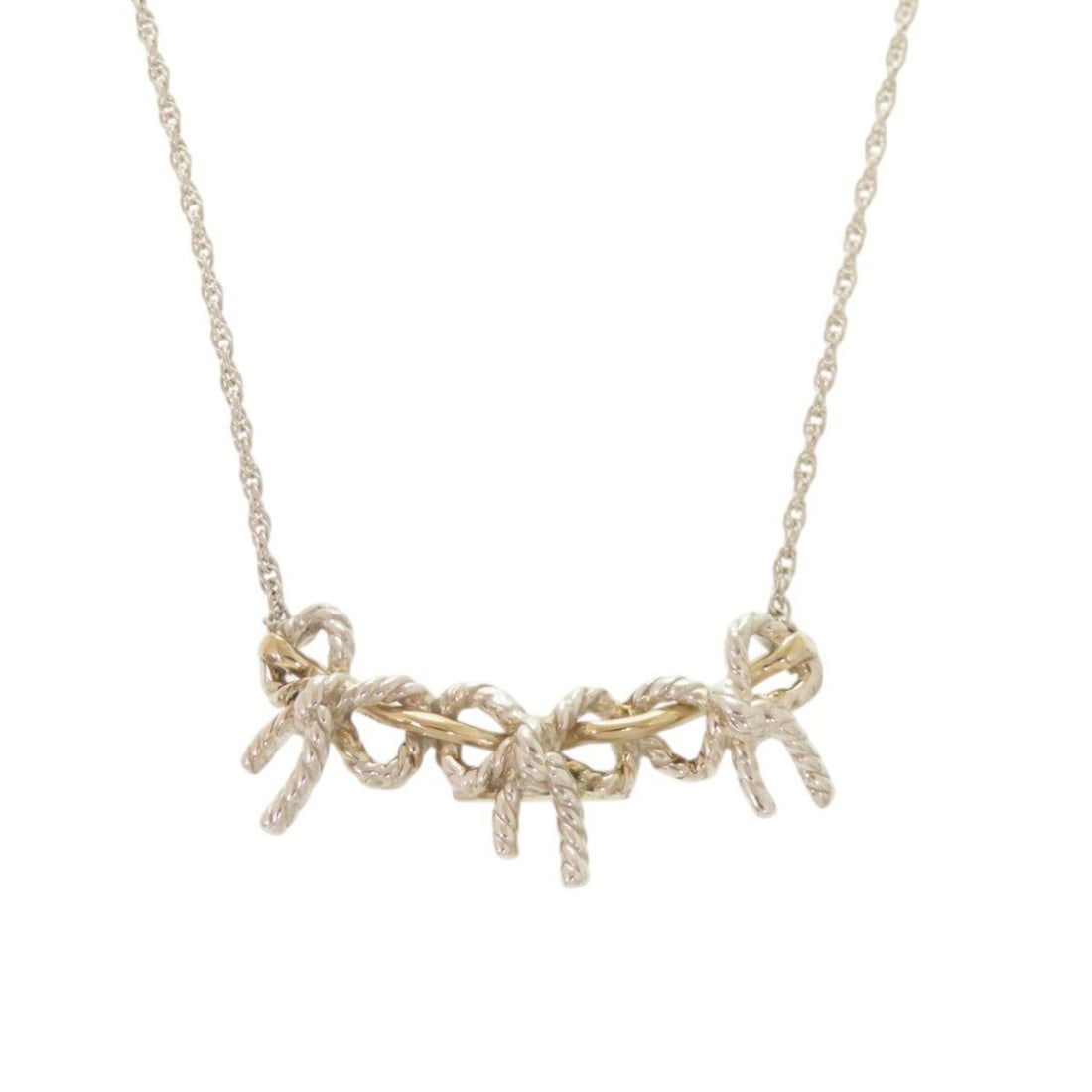 Tiffany & Co. Triple Ribbon Necklace, Sterling Silver 925, 18K Yellow Gold (750YG), Item No. 1141.: --- Catalog ---Category: SizePendant Size: 13mm x 34mm / 0.51'' x 1.33''Neck Circumference: 48.5 cm / 19.09''Category: DesignColor: Silver, Yellow goldGender: WomenMaterial: Silver 925, Yellow gold (1