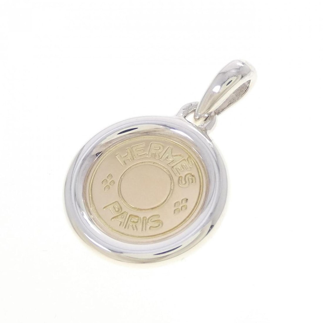 Hermes Sellier Pendant: --- Catalog ---Category: SizePendant Size: 30.8mm x 19.7mm / 1.21'' x 0.77''Category: DesignColor: Gold, SilverGender: WomenPendant Type: PendantCategory: GeneralBrand: Hermes--- Item List ---Section: