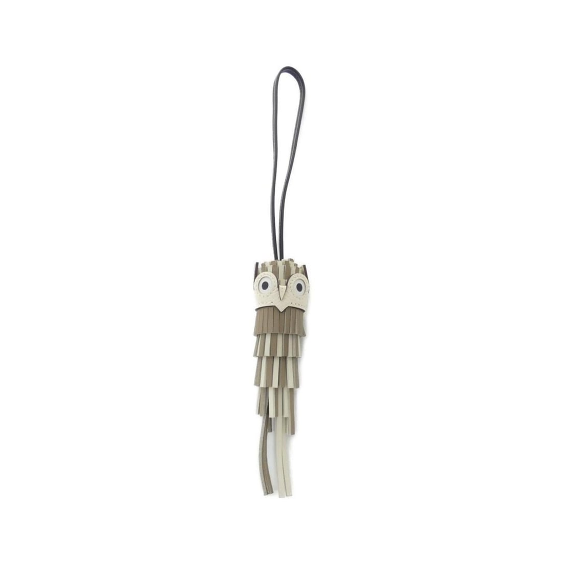 Hermes Chouette 085001CA Accessory Bag Charm: --- Catalog ---Category: SizeSize (HxWxD): 13.00mm x 3.00mm / 0.51'' x 0.12''Category: DesignType: Handbag charmColor: Beige, BlackGender: WomenMaterial: Agneau MiloCategory: GeneralMPN: 085001CABrand