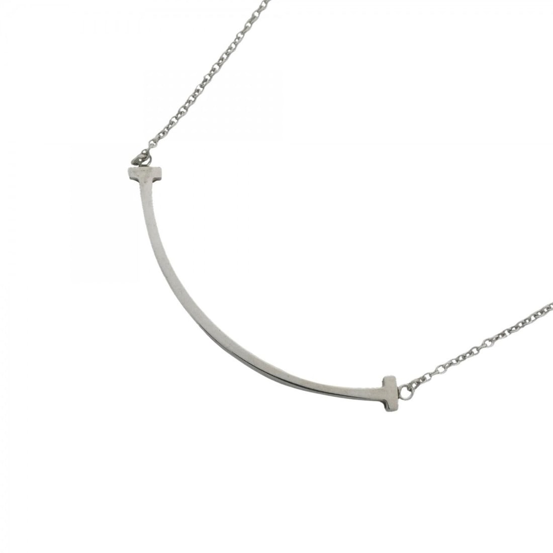 Tiffany & Co. T Smile Small Sterling Silver Necklace for Women: --- Catalog ---Category: SizePendant Size: 9.8mm x 36.8mm / 0.38'' x 1.44''Neck Circumference: 41 cm - 46 cm / 16.14'' - 18.11''Category: DesignGender: WomenMaterial: Silver 925Necklace Type: Necklace