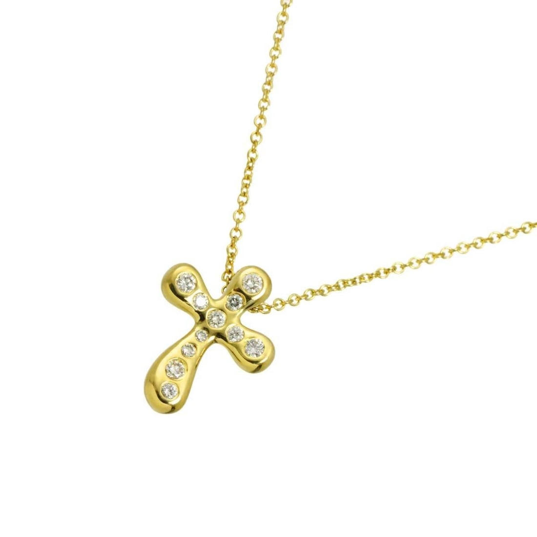 Tiffany & Co. Dots Cross Diamond Necklace, 41cm, 18K Yellow Gold (750): --- Catalog ---Category: SizeWeight: 4.5g / 0.15oz.Pendant Size: 16mm x 12mm / 0.62'' x 0.47''Neck Circumference: 41 cm / 16.14''Category: DesignColor: YellowMetal: GoldStone: DiamondGender: WomenMeta