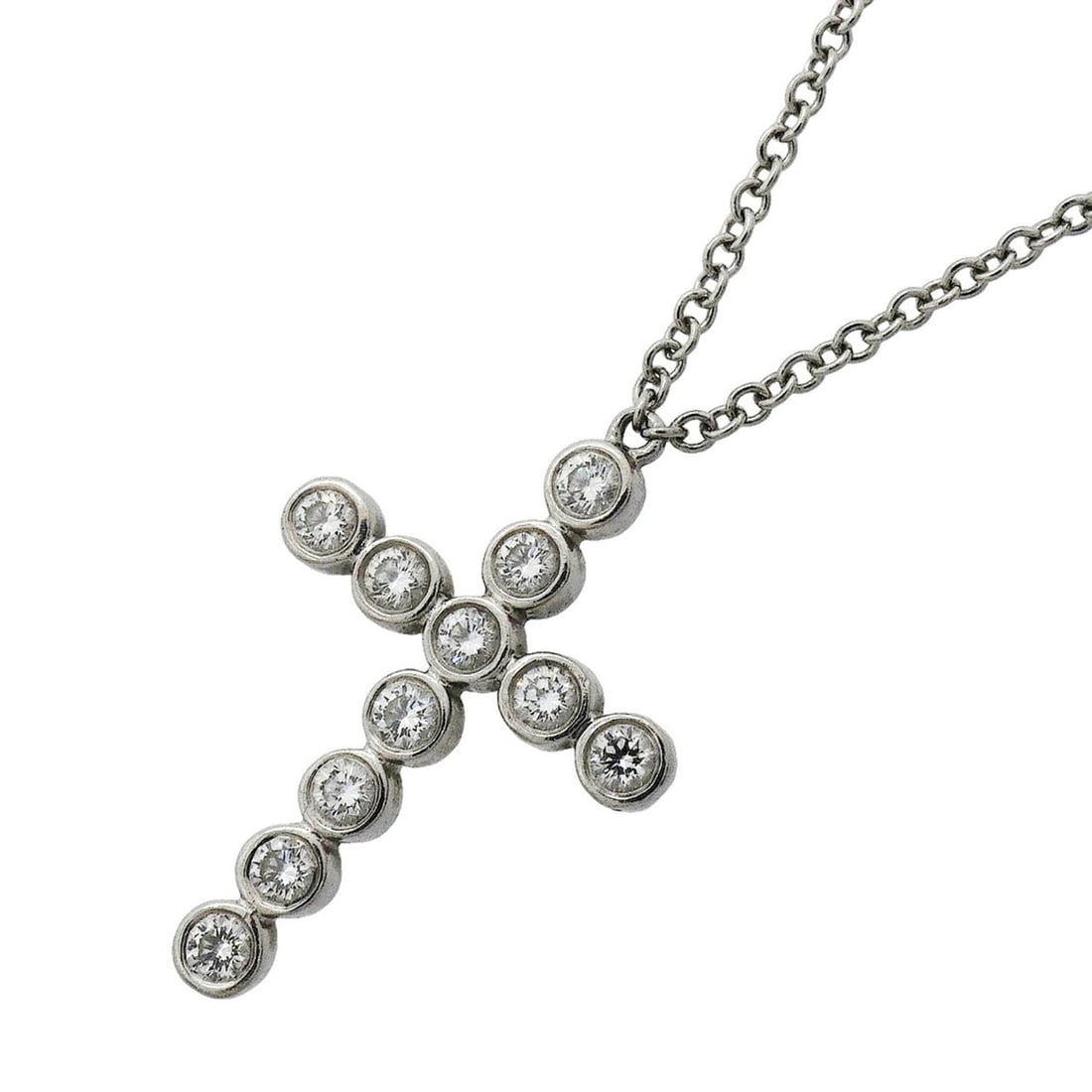 Tiffany & Co. Jazz Cross Necklace, 11PD (Pt950) Platinum Diamond, Ladies' Necklace: --- Catalog ---Category: SizePendant Size: 18.3mm x 12mm / 0.72'' x 0.47''Neck Circumference: 41.5 cm / 16.33''Category: DesignStone: DiamondGender: WomenMaterial: Platinum 950Necklace Type: NecklaceC
