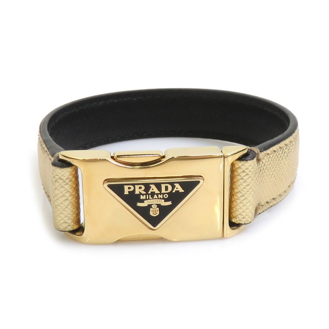 Prada PRADA Bracelet Leather Metal Gold Men's Women's r11335k: --- Catalog ---Category: SizeLength: 20cm / 7.87''Category: DesignType: Charm braceletColor: GoldGender: Men,WomenMaterial: Leather, MetalCategory: GeneralBrand: Prada--- Item List ---Section: Conditi