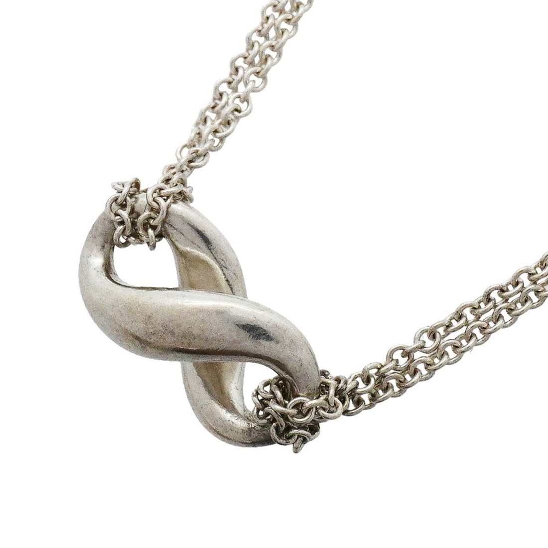 Tiffany & Co. Infinity Double Chain Necklace, Sterling Silver 925, Women's: --- Catalog ---Category: SizePendant Size: 9.2mm x 18.3mm / 0.36'' x 0.72''Neck Circumference: 40 cm / 15.74''Category: DesignGender: WomenMaterial: Silver 925Necklace Type: NecklaceCategory: GeneralB