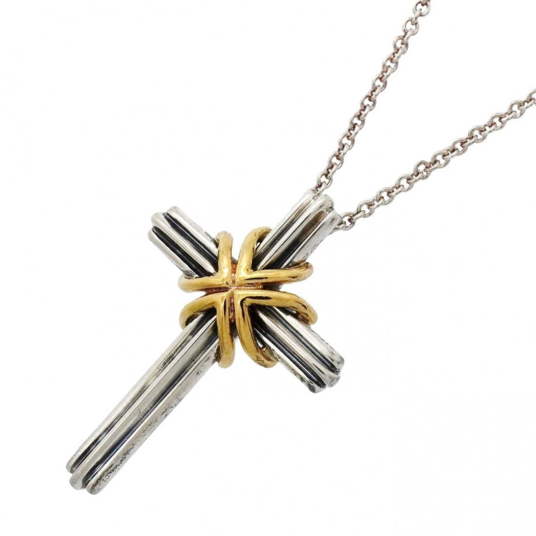 Tiffany & Co. Signature Cross Necklace, 18K Yellow Gold (KYG), Sterling Silver 925, Women's: --- Catalog ---Category: SizePendant Size: 33.2mm x 22.2mm / 1.3'' x 0.87''Neck Circumference: 46 cm / 18.11''Category: DesignGender: WomenMaterial: Silver 925, Yellow gold (18K)Necklace Type: Necklac