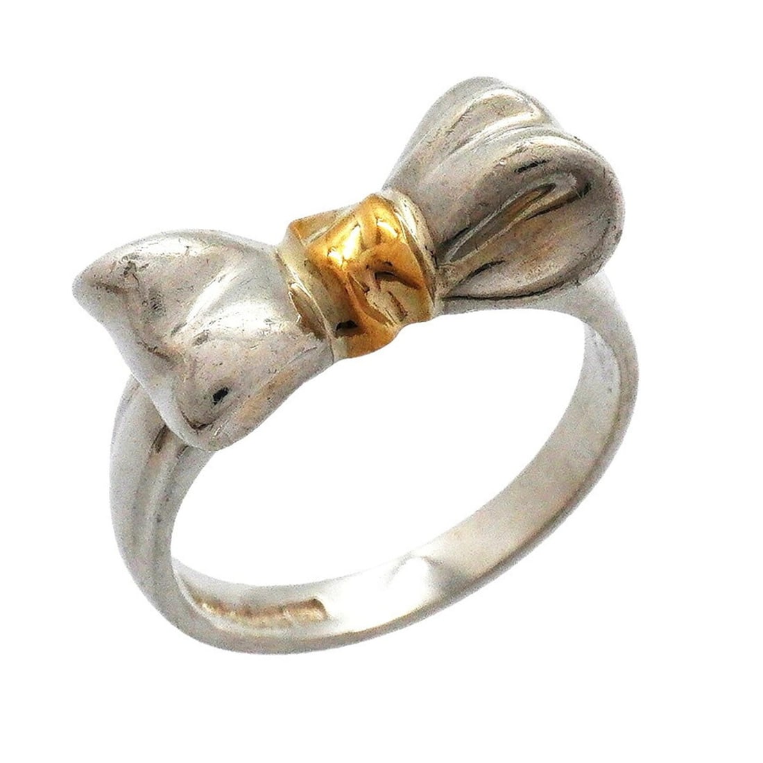 Tiffany & Co. Ribbon Ring, 18K Yellow Gold (KYG), Sterling Silver 925, Size 11, Women's: --- Catalog ---Category: SizeJP Size: 11US Size: 6Category: DesignType: Band ringGender: WomenMaterial: Silver 925, Yellow gold (18K)Category: GeneralBrand: Tiffany--- Item List ---Section: ConditionR