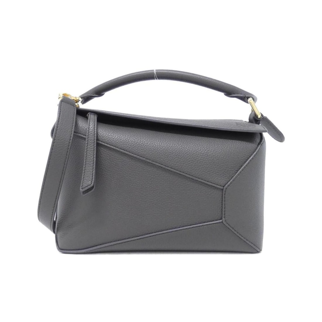 Loewe Puzzle Edge Small A510P60X30 Handbag: --- Catalog ---Category: SizeSize (HxWxD): 17cm x 24cm x 10cm / 6.69'' x 9.44'' x 3.93''Category: DesignType: HandbagColor: Dark grayGender: WomenMaterial: Leather Category: GeneralBrand: Loewe--- Ite