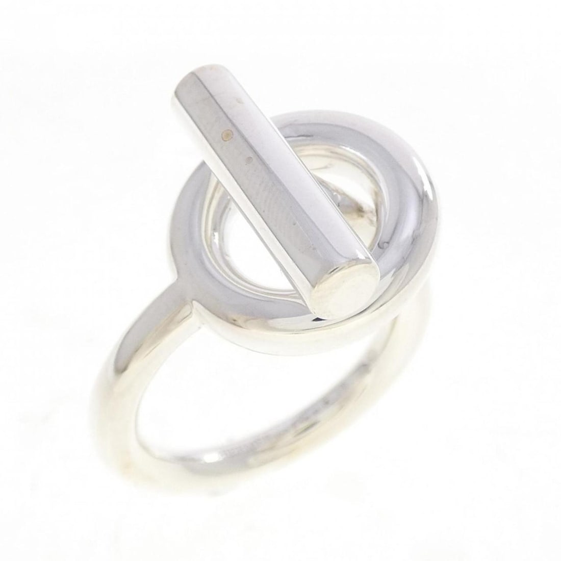 Hermes Hermès Echappé Ring: --- Catalog ---Category: SizeUS Size: 6.5Brand Size: 52Category: DesignType: Band ringGender: WomenMaterial: Silver 925Category: GeneralBrand: Hermes--- Item List ---Section: ConditionRanking: Rank A 