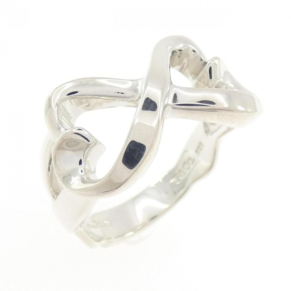 Tiffany Double Loving Heart Ring: --- Catalog ---Category: SizeJP Size: 13US Size: 6.5Category: DesignType: Band ringGender: WomenMaterial: Silver 925Category: GeneralBrand: Tiffany--- Item List ---Section: ConditionRanking: Rank SA