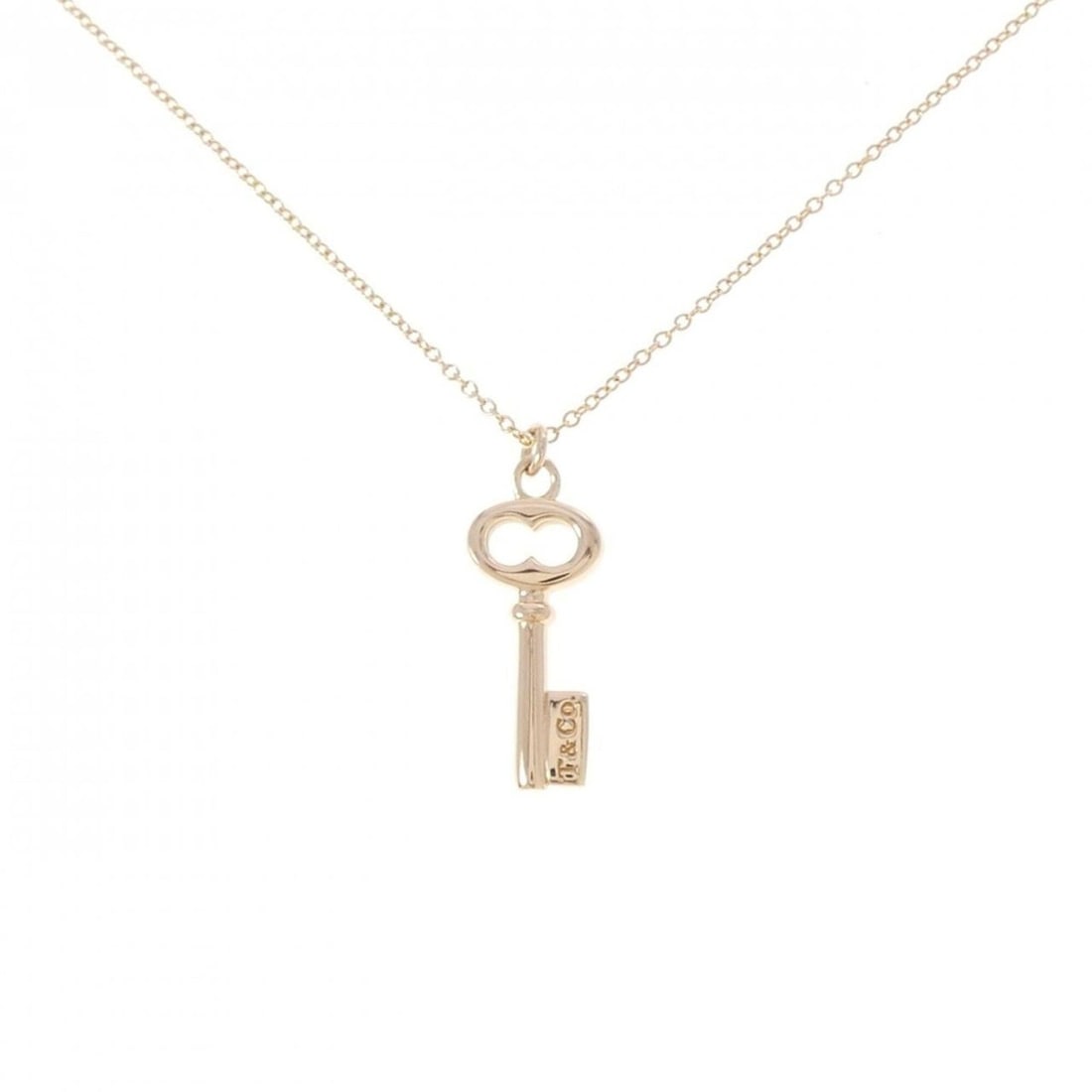 Tiffany Vintage Oval Key Mini Necklace: --- Catalog ---Category: SizePendant Size: 22.7mm x 8.4mm / 0.89'' x 0.33''Neck Circumference: 41 cm / 16.14''Category: DesignGender: WomenMaterial: Pink gold (18K)Pendant Type: PendantNecklace Type: