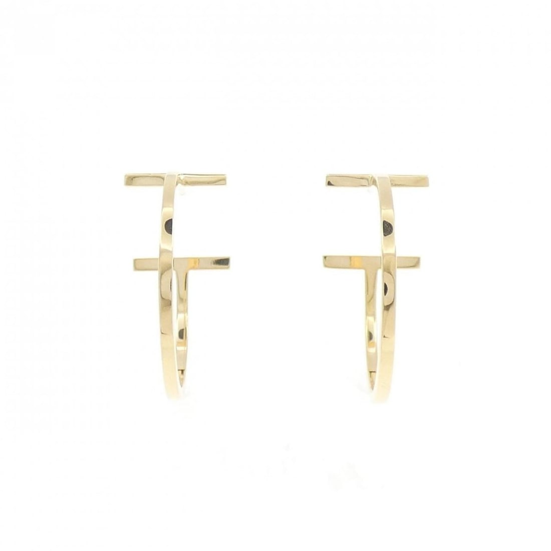Tiffany & Co. T Wire Hoop Medium Earrings: --- Catalog ---Category: SizeSize (HxWxD): 22.70mm x 10.40mm / 0.89'' x 0.41''Category: DesignType: Half hoop earringsGender: WomenMaterial: Yellow gold (18K)Category: GeneralMPN: 60011241Brand: