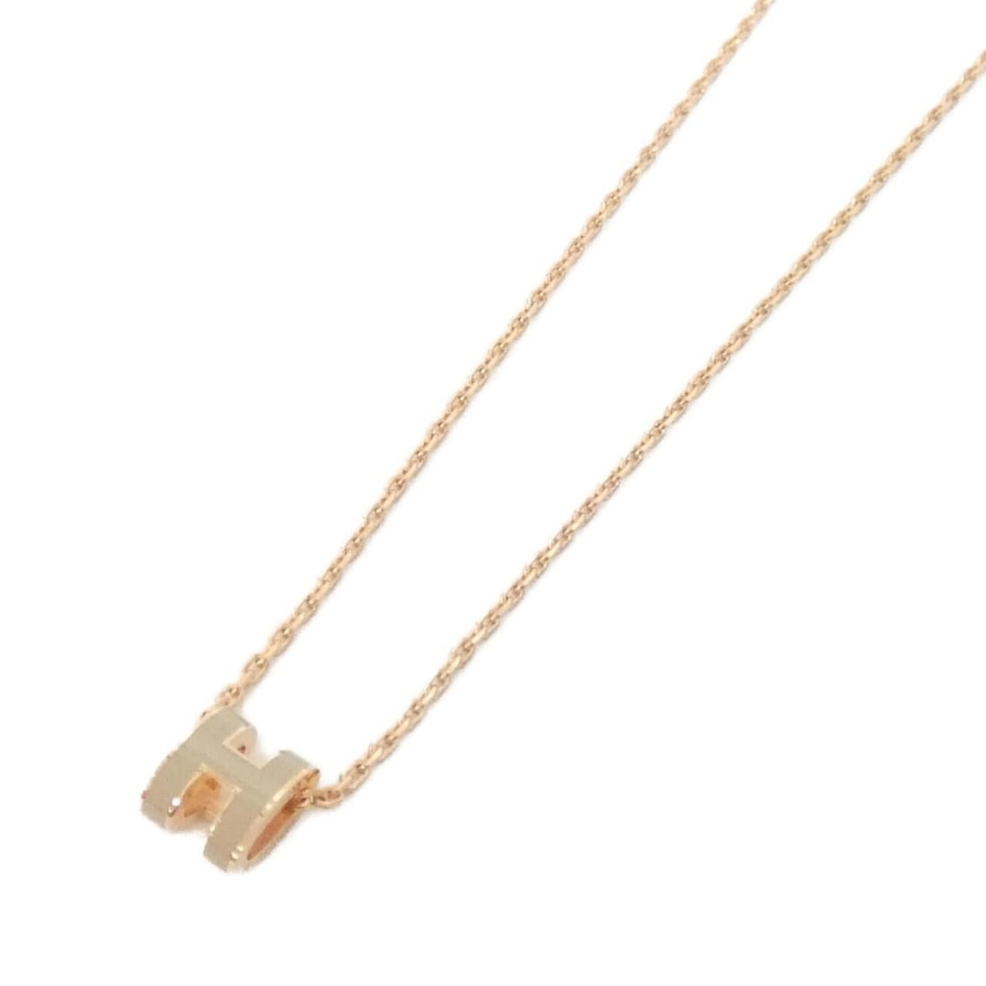Hermes Pop H MINI 147992FO Necklace: --- Catalog ---Category: SizePendant Size: 0.7mm x 0.9mm / 0.02'' x 0.03''Neck Circumference: 39.5 cm / 15.55''Category: DesignColor: MarronGender: WomenMaterial: PalladiumNecklace Type: