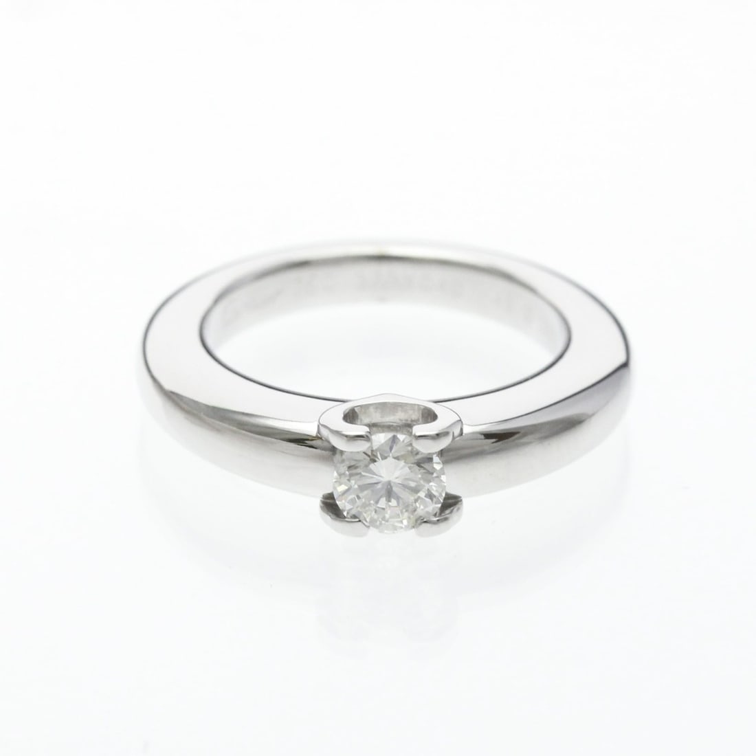 Cartier C de Solitaire Ring 0.37CT White Gold Condition Rank A Weight 8.2g: --- Catalog ---Category: SizeWeight: 8.2g / 0.28oz.Category: DesignWeight (ct.): 0.37Category: GeneralBrand: Cartier--- Item List ---Section: ShippingTotal Weight: 220g / 7.76oz.Section: ConditionRank